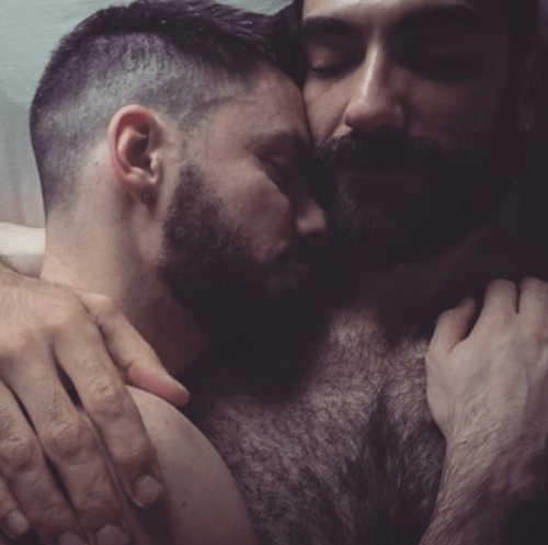 men in bed, men cuddling