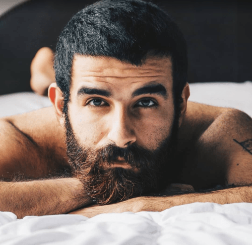 handsome guy in bed, hunk, man with facial hair