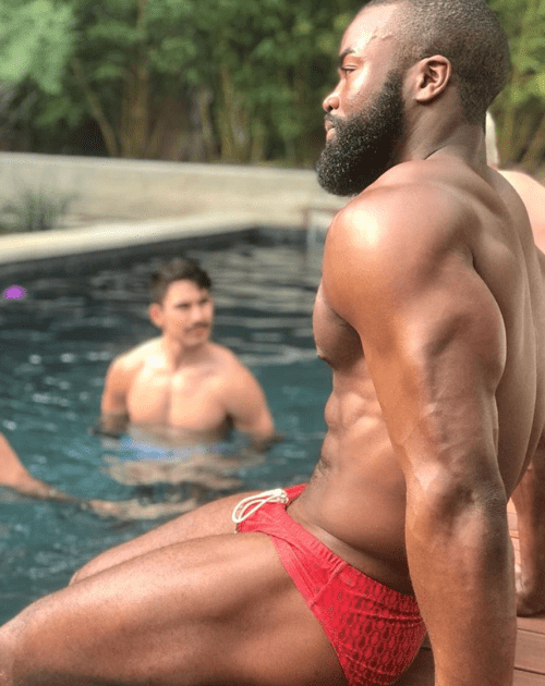 handsome black man, black man in a speedo, red