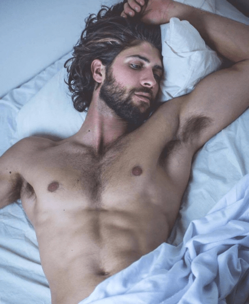 handsome man in bed, muscular man in bed, hairy man in bed