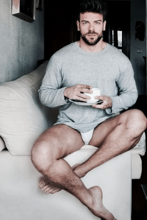 handsome, hunk man drinking coffee