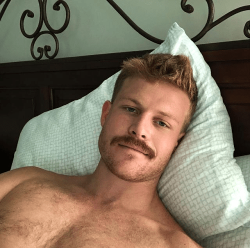 man in bed, handsome, mustache