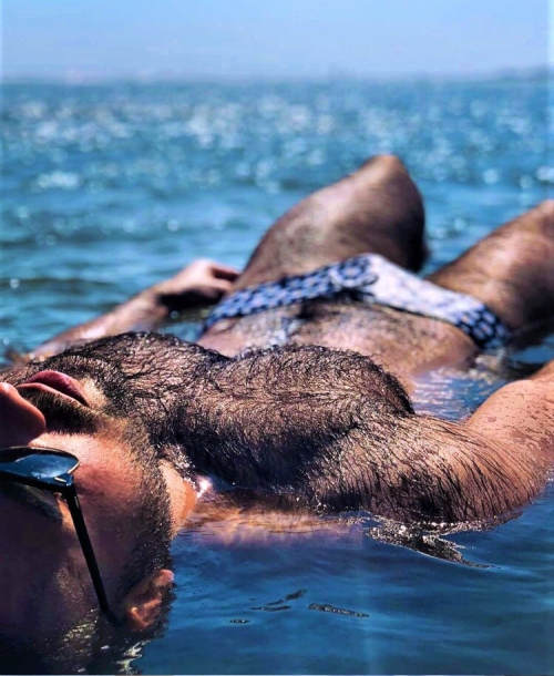 hairy, wet fur, guy at the beach