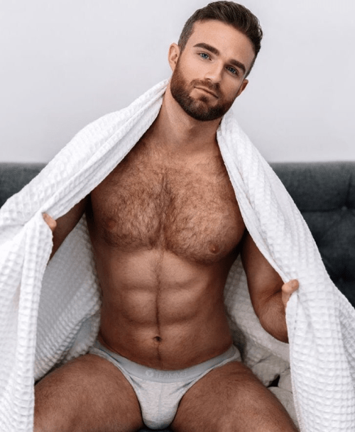 hairy man in a white towel
