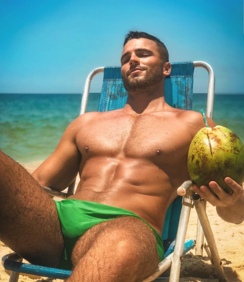 man in a speedo, green