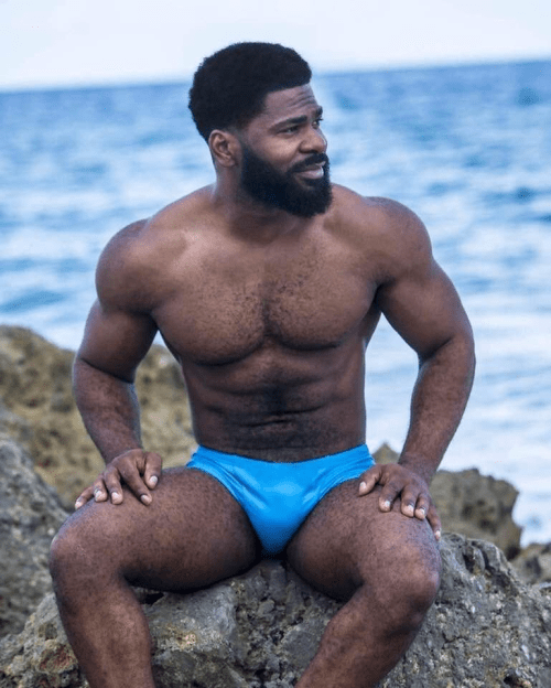 blue, handsome man in speedo