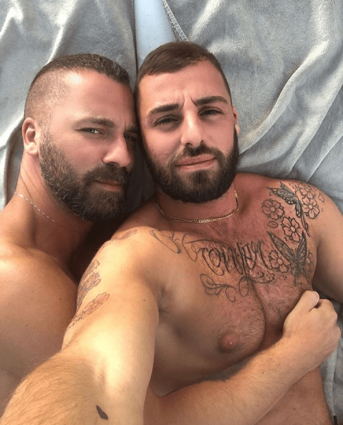handsome couple in bed